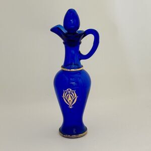 Vintage Avon Cobalt Blue Glass Decanter Or Crue With Gold Trim And A Stopper